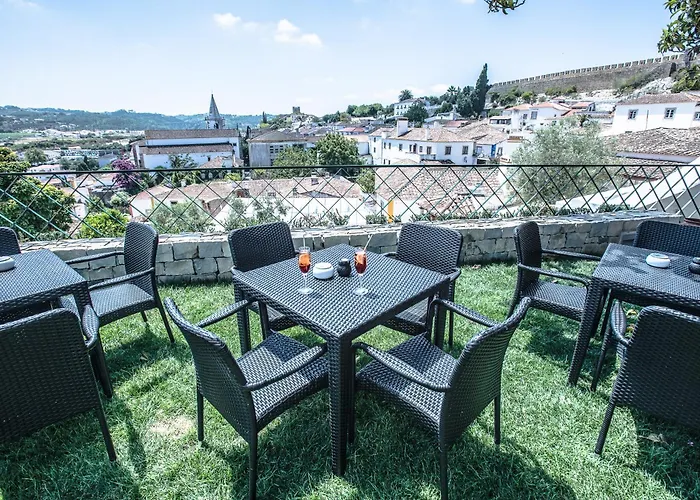 Castelo De 4* אובידוס